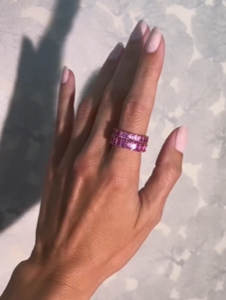 5-carat and 7.75-carat pink sapphire emerald cut eternity bands.